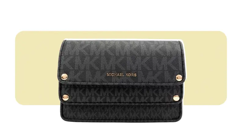 A belt-bag style wallet that is made up of faux leather printed with the Michael Kors initials logo.