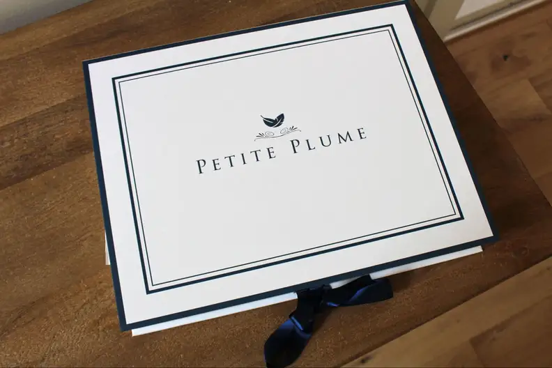 Petite Plume packaging with the brand logo on top