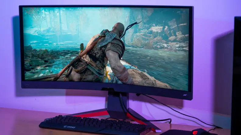 A computer monitor showing a video game character in a boat