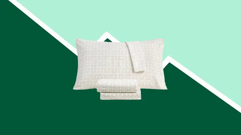 Pillows against a green backgrouns