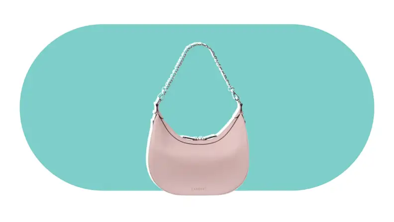 A pink crescent-shaped handbag.