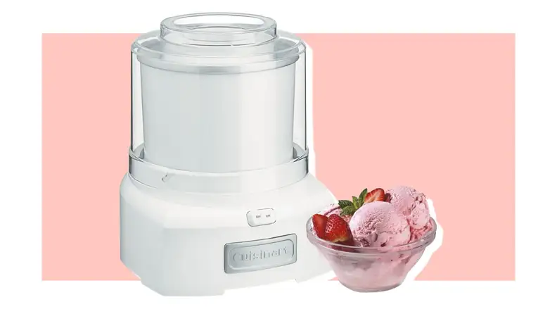 Cuisinart Ice Cream Maker and bowl of strawberry ice cream on pink background
