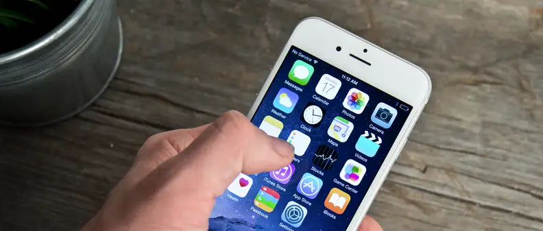 A photograph of the Apple iPhone 6 in use.