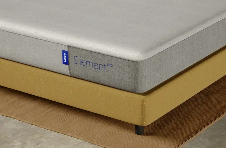 Close-up shot of the Casper Element Pro logo on the corner of the mattress.