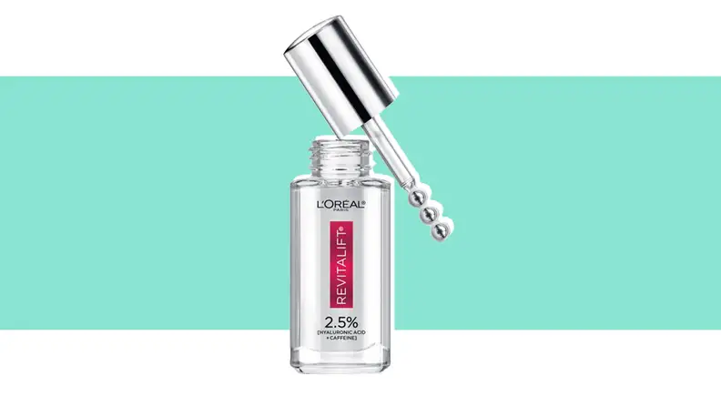 Under-eye serum against a green background.