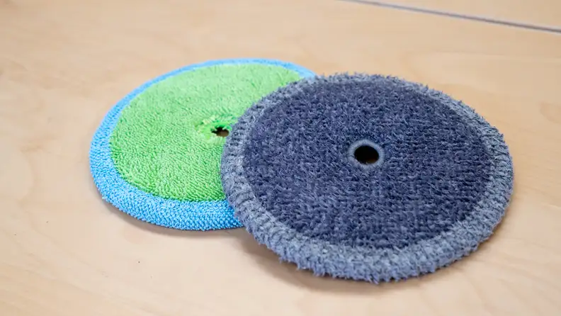 A pair of soft round pads: these were removed from the base of a Samsung Jetbot Mop.