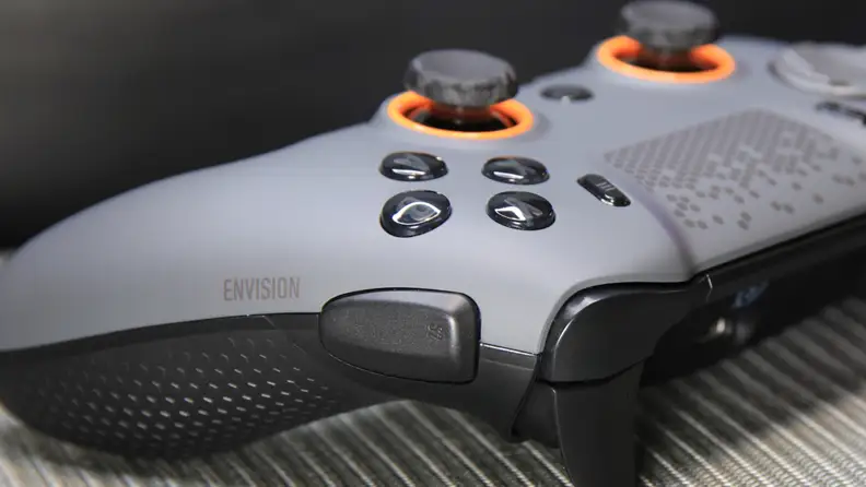 Side view of the gray Scuf Envision Pro gaming controller.