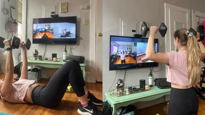 A woman using the Peloton Guide.
