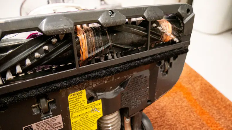 String wrapped around the brush roll of the DU5092