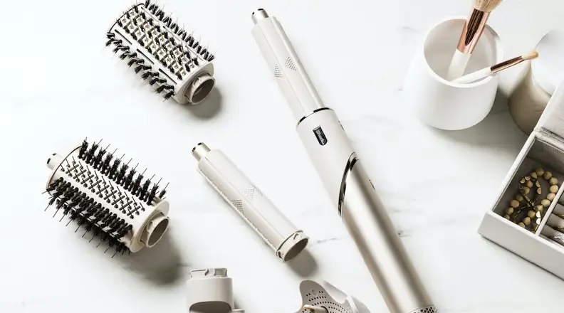 The Shark FlexStyle hair styler and attachments spread out on a counter