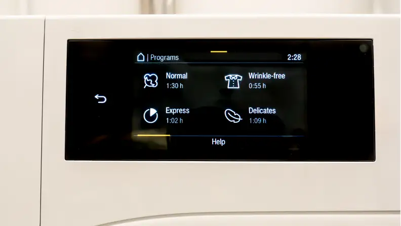 Close-up view of the drying machine's touchscreen
