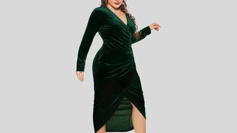 Woman in green velvet party dress