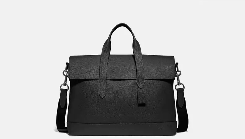 Black portfolio bag on gray background.