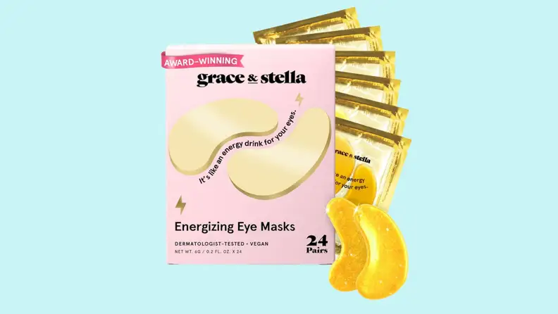 The packaging of Grace & Stella eye masks, with 6 sample packaged masks and two unpackaged gold eye masks.