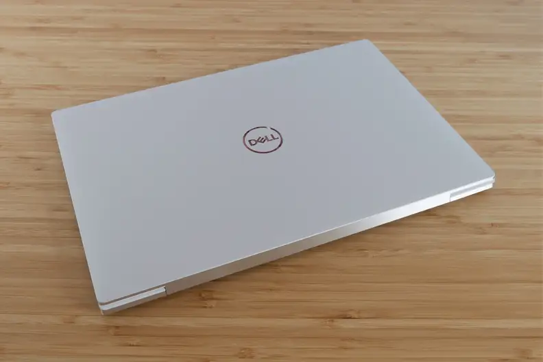 A close laptop on top of a table.