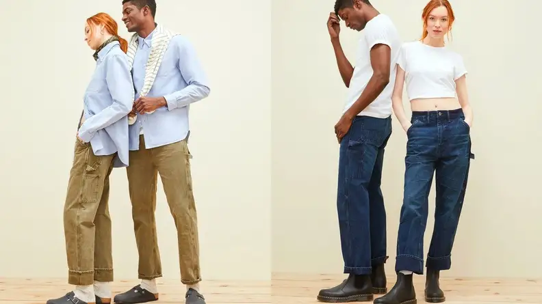 Two people modeling clothing from American Eagle's premium denim brand, AE77.