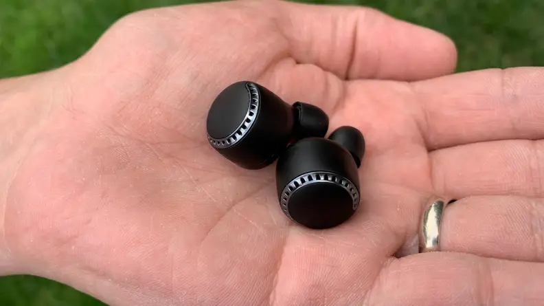 Panasonic RZ-S500W earbuds in hand
