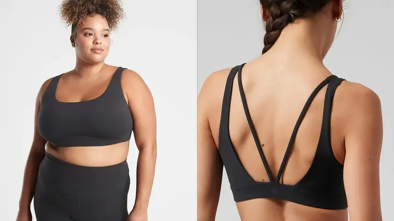 A woman wearing the Athleta Exhale bra.