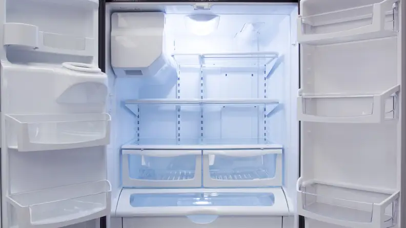 A Whirlpool refrigerator with doors open