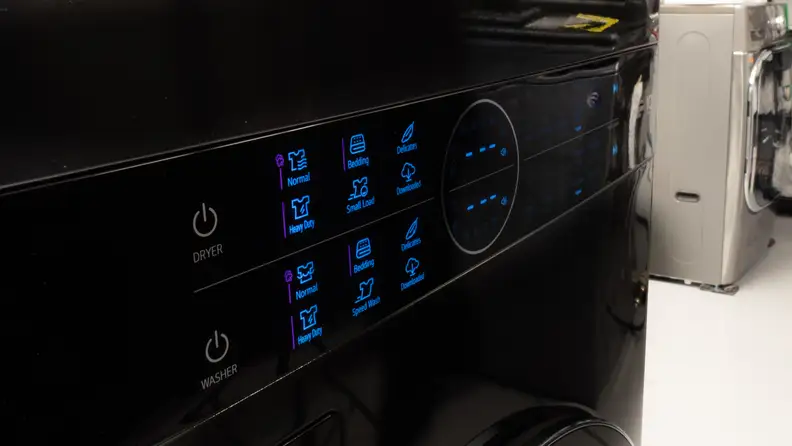 A close-up of the LG WashTower's control panel, located in the center of the device.