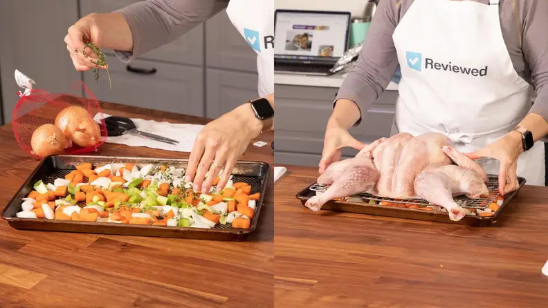 On left, person arranging chopped vegetables on baking sheet. On right hands placing spatchcocked turkey atop vegetables.