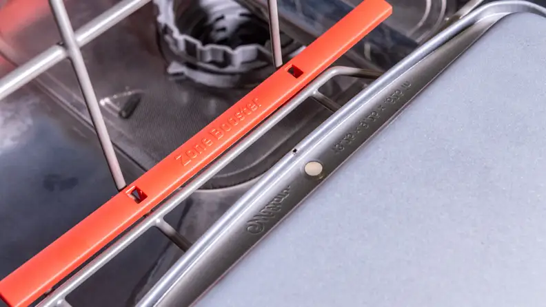 Zone Boost of the Samsung DW80M9960US  is a feature that directs nozzles towards the left-hand side of the lower rack. It cleaned even baked-on stains.