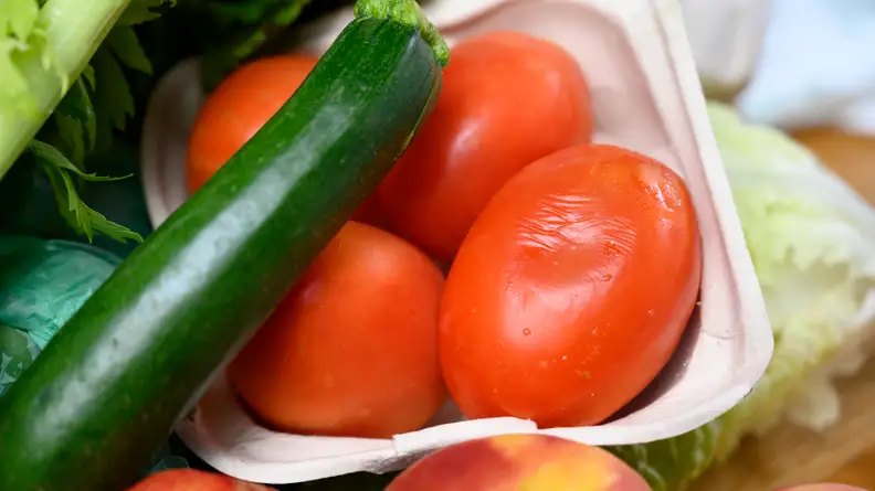 A tomato with minor imperfections like these could otherwise wind up going into waste.