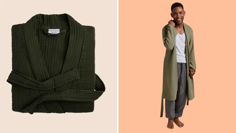 Folded robe next to man wearing robe