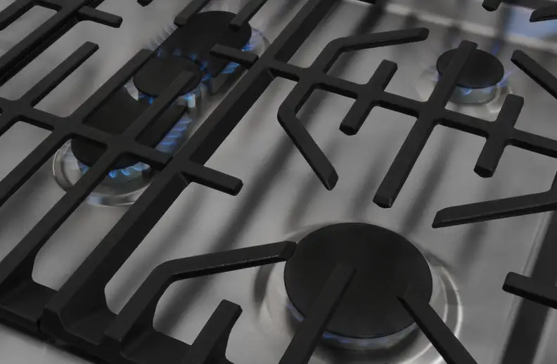 rangetop with gas burners turned on