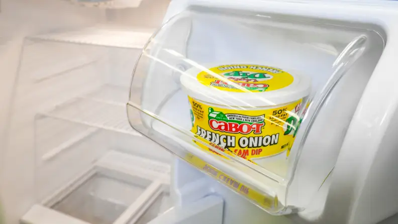 The Hotpoint HPS15BTHMRWW has a covered dairy bin to keep butter and cheese from absorbing odors