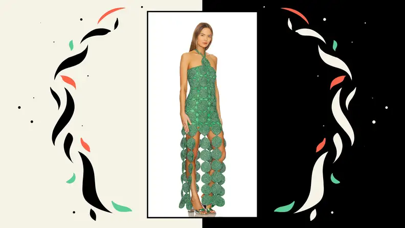 A model wearing a woven gown that features long, swinging circular fringe.