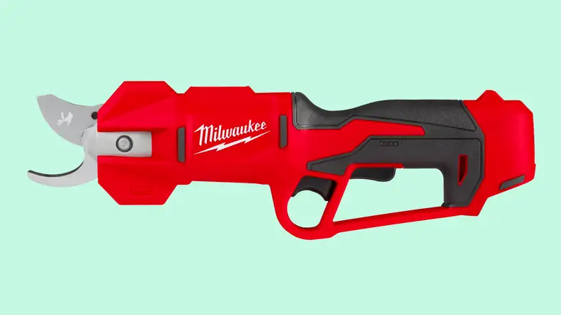 A close-up of the Milwaukee hedge trimmer on a light green background.
