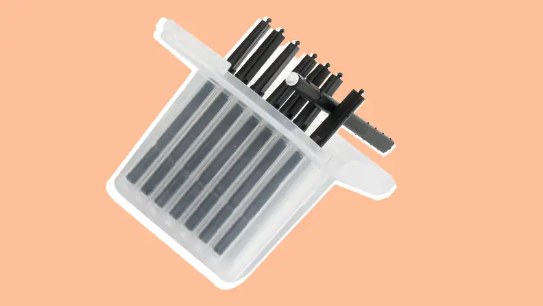 Clear case filled with Hearing aid Wax Guard Filter.