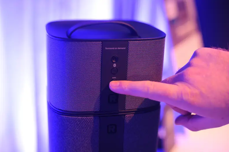 Pressing the Surround on Demand button on the Philips Fidelio E6