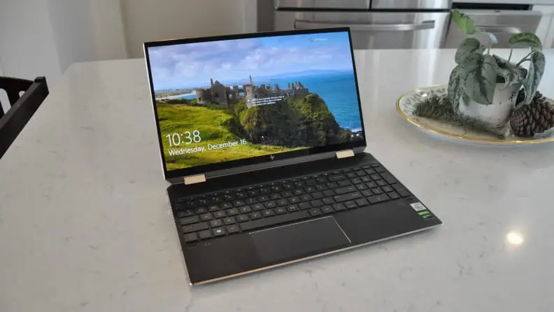A laptop on a table, open
