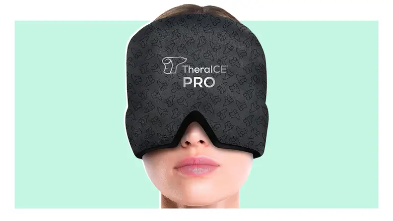 Person wearing a black TheraIce RX Migraine Relief Cap over eyes.