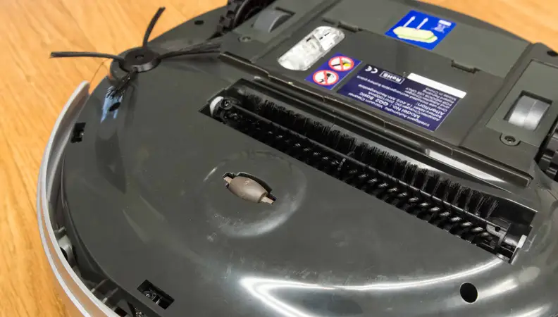 The rotating brush on the side helps scoop up dirt.