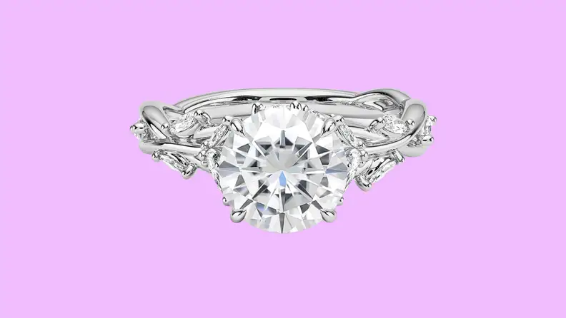 Photo of the Brilliant Earth Secret Garden Ring against a purple background.