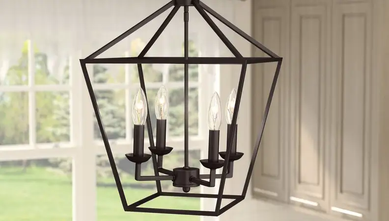 Iron candelabra against bright window