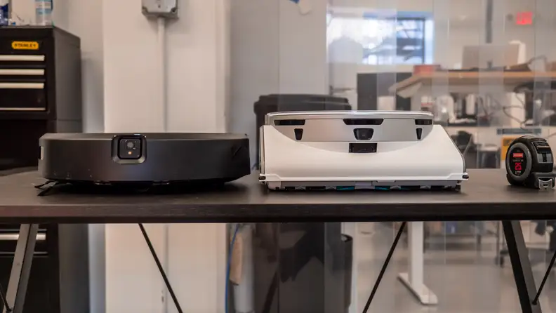 The Samsung Jet Bot A.I.+ next to the iRobot Roomba j7+