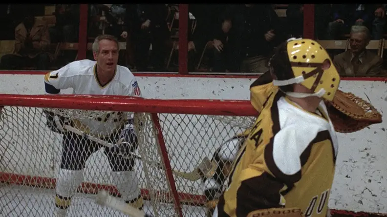 Paul Newman attempting a goal.