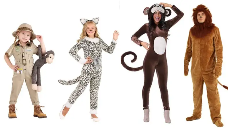 A child in a zookeeper costume, a child in a snow leopard costume, a woman in a monkey costume, a man in a lion costume.