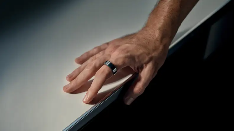 A man wearing the Oura Ring Gen 3.