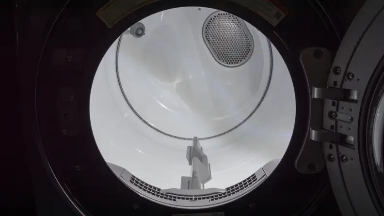 The drum is spacious, white, and brightly lit