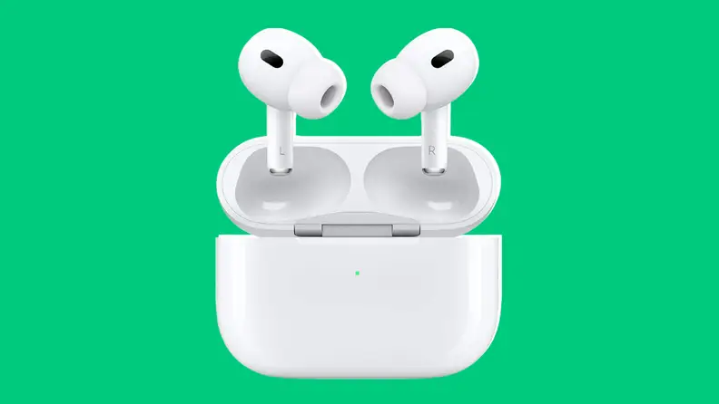 Apple airpods pro in case on green background.