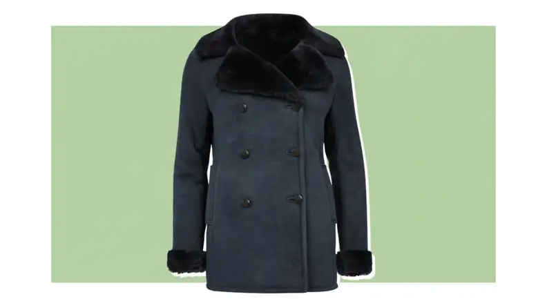A navy peacoat-style shearling coat.