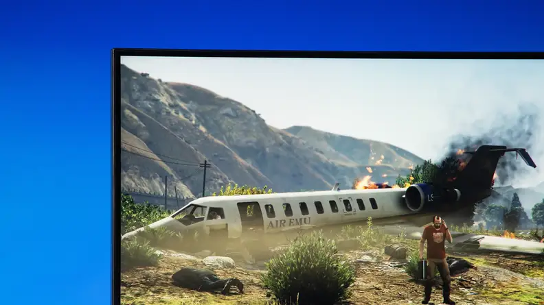 The gaming monitor displaying Grand Theft Auto V.