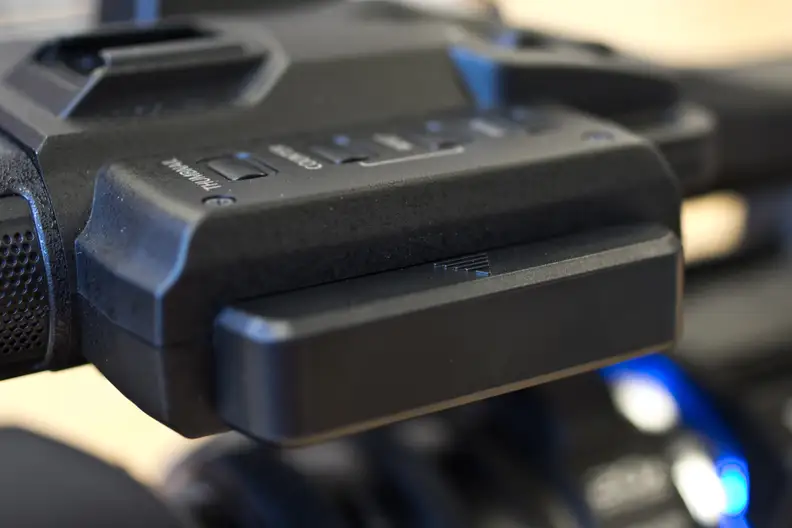The LCD can be flipped down and stowed within the top handle of the X1000, protecting the screen.