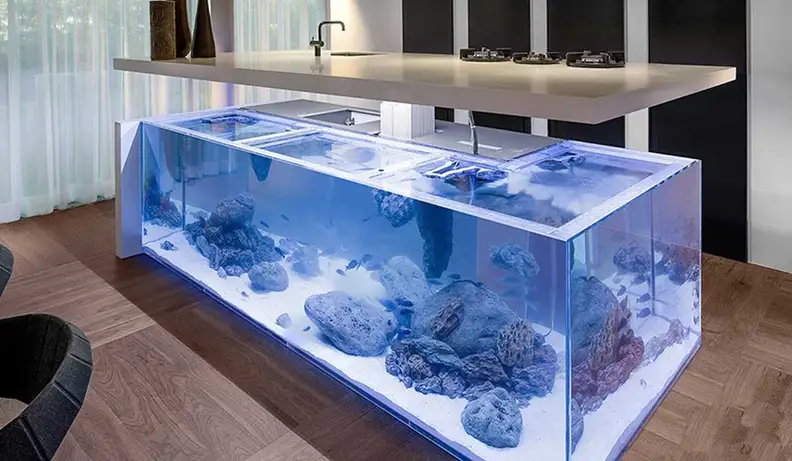 With the push of a button, the entire counter lifts up for aquarium access.