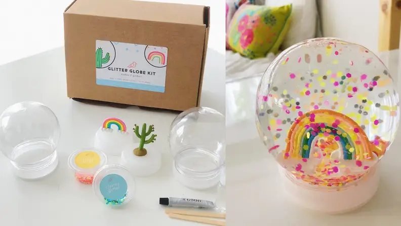 A snow globe kit and a snow globe.